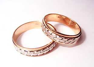 two gold-colored rings